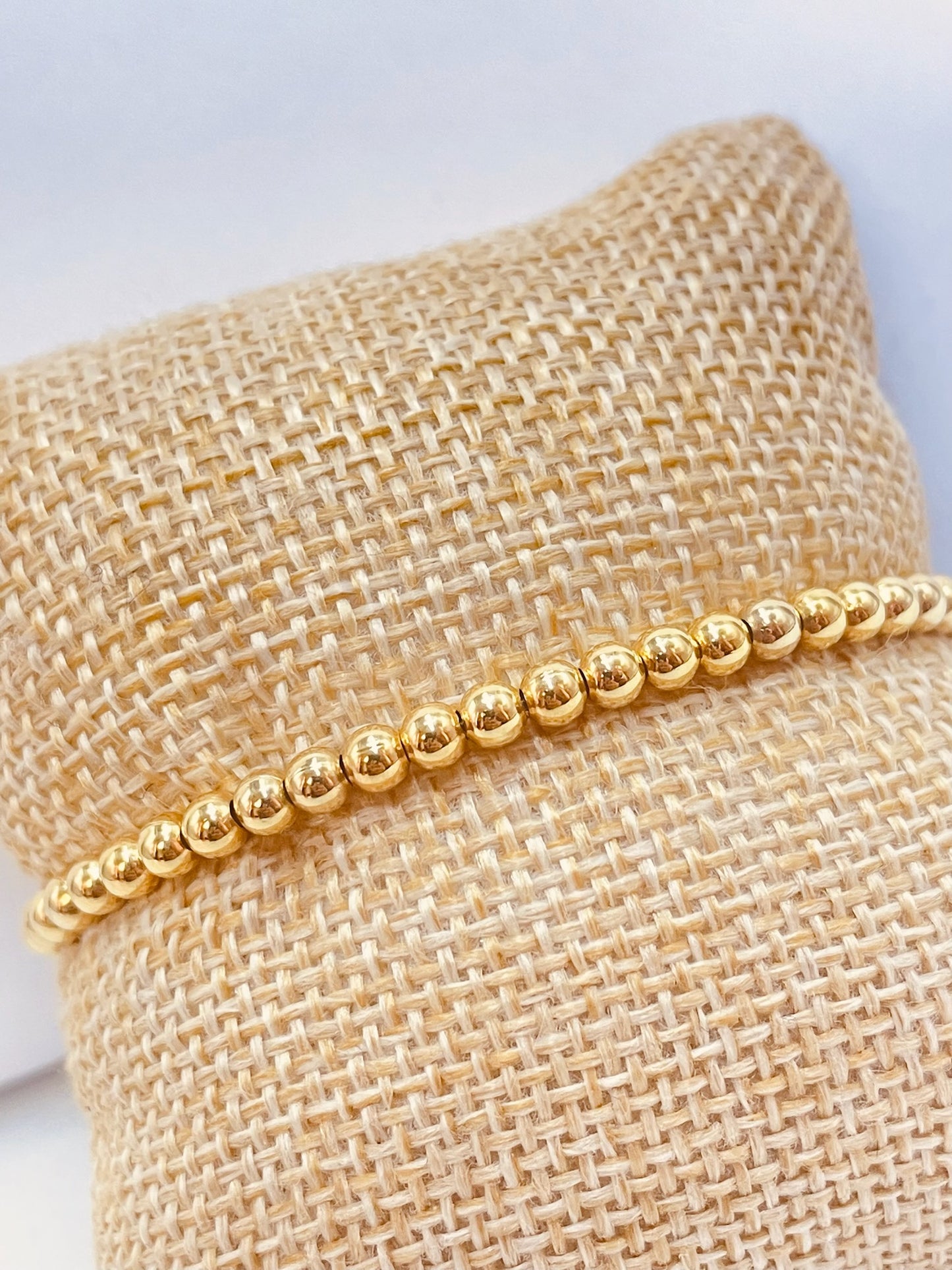 ZO3009 Pulsera Elastizada Bolitas 3mm Baño Oro