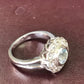 ZAJ15 Anillo Flor Aguamarina Diamantes Engaste Invisible Oro Blanco